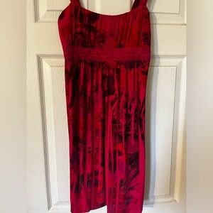 Preowned beautiful pink floral dress with nice lace band on chest